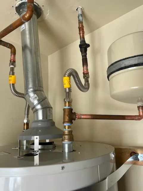 Water heater installation and plumbing repair in El Tivoli Place